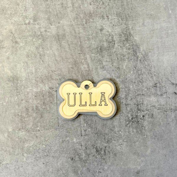 Gummi-ramme til hundetegn, så det ikke larmer (kødben stor)