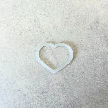 Rubber frame for dog tags so it doesn't make noise (large heart)